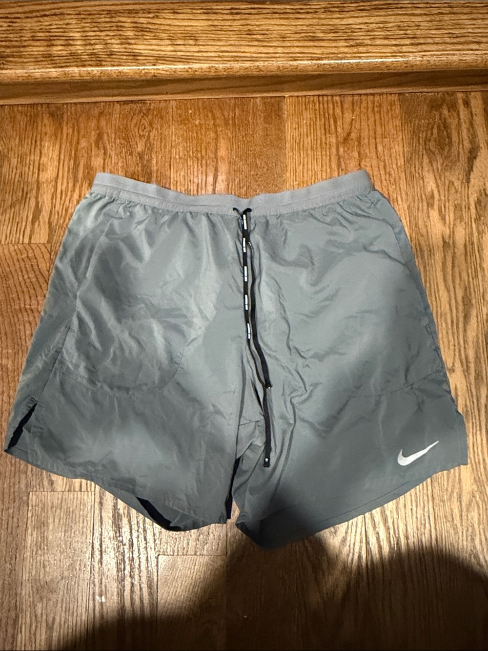 Nike Grey Athletic Running Shorts with White Swoosh 5in inseam